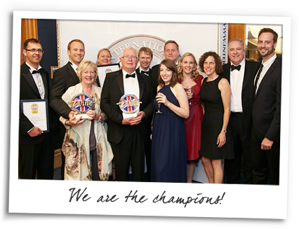 Team photo with awards